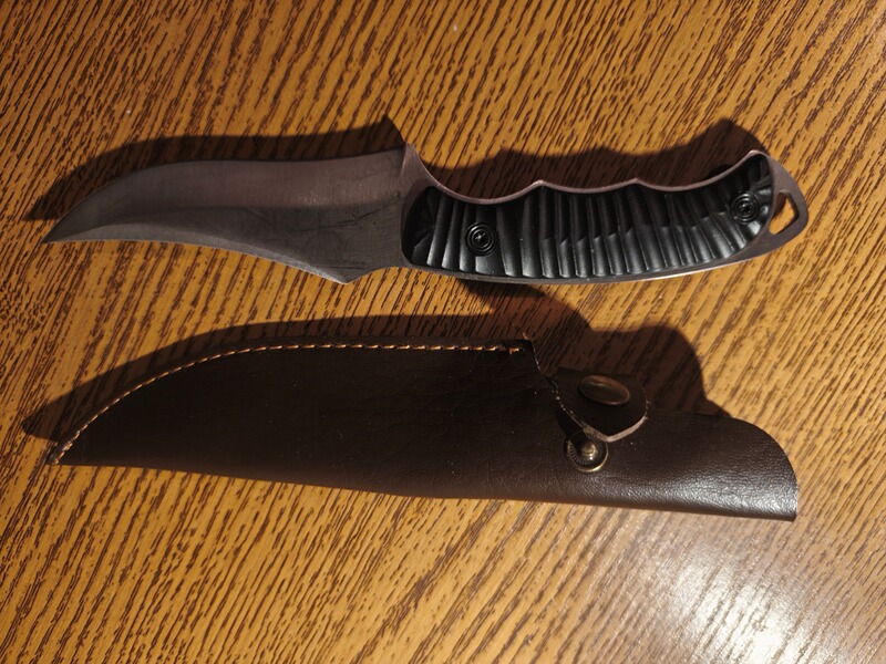 Kleine Jagdmesser mit Kunstledertasche , siehe Bilder .